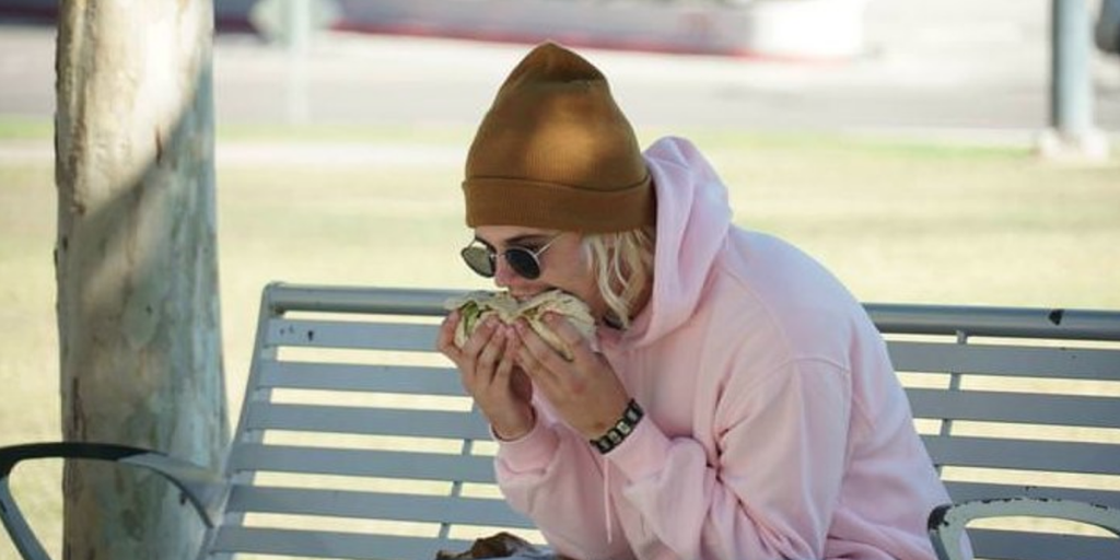 Justin Bieber stuffing his face full of a burrito